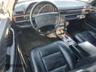 1989 Mercedes-Benz 560 with VIN WDBCA45E4KA498009, listed as a Copart auction lot 53897215 with 366,931 mi miles and Clean Title. Bid and sale history available at DreamBid. Image 8.