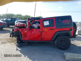 2015 Jeep Wrangler Unlimited Sport with VIN 1C4BJWDG4FL694005, listed as a IAAI auction lot 41971529 with Not provided miles and . Bid and sale history available at DreamBid. Image 14.