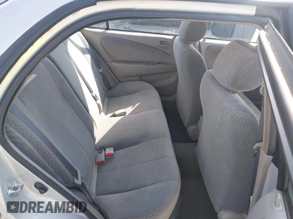 2002 Toyota Corolla CE with VIN 1NXBR12EX2Z637420, listed as a IAAI auction lot 42433300 with 98,353 mi miles and . Bid and sale history available at DreamBid. Image 8.