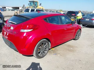 2015 Hyundai Veloster RE:FLEX with VIN KMHTC6AD7FU220449, listed as a IAAI auction lot 41752430 with 70,132 mi miles. Bid and sale history available at carsss.com. Image 4.