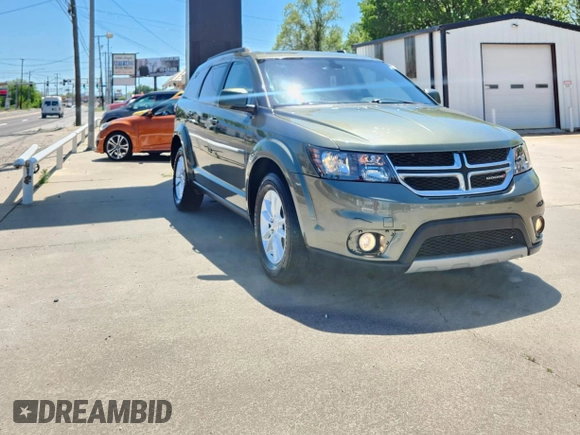 2017 Dodge Journey SXT with VIN 3C4PDCBG4HT598882, listed as a Copart auction lot 56783495 with 89,771 mi miles and Salvage Title. Bid and sale history available at DreamBid. Image 5.