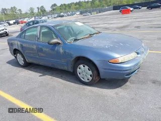 1999 Oldsmobile Alero GL z VIN 1G3NL52TXXC339892, wystawiony jako IAAI lot #41935539 z przebiegiem 315 555 mil mil oraz . Historia ofert i sprzedaży dostępna na DreamBid. Obrazek 1.