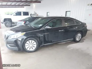 2016 Hyundai Sonata Hybrid SE with VIN KMHE24L12GA037983, listed as a IAAI auction lot 42078321 with 113,998 mi miles. Bid and sale history available at carsss.com. Image 2.