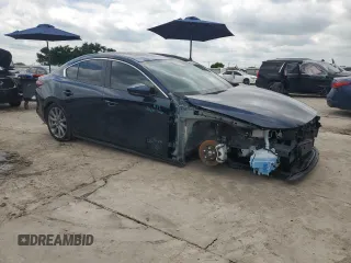 2023 Mazda 3 S Carbon Edition with VIN 3MZBPACM9PM366679, listed as a Copart auction lot 55825035 with 19,745 mi miles and Salvage title. Bid and sale history available at DreamBid. Image 4.