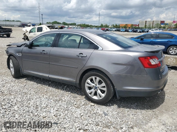 2011 Ford Taurus SEL z VIN 1FAHP2EWXBG190610, wystawiony jako Copart lot #56993785 z przebiegiem 119 784 mil mil oraz Szkoda całkowita • Salvage title. Historia ofert i sprzedaży dostępna na DreamBid. Obrazek 2.