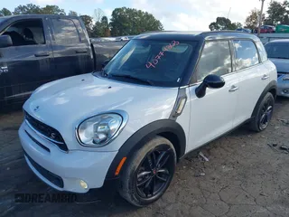 2015 MINI Countryman S with VIN WMWZC3C5XFWT06360, listed as a IAAI auction lot 40774863 with 127,383 mi miles and . Bid and sale history available at DreamBid. Image 17.