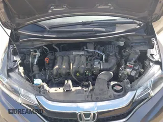 2020 Honda Fit LX with VIN 3HGGK5H46LM725764, listed as a IAAI auction lot 42499144 with 79,758 mi miles and . Bid and sale history available at DreamBid. Image 10.
