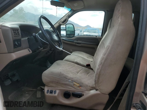 1999 Ford F-250 XL with VIN 1FTNX21F8XEE00658, listed as a Copart auction lot 70021594 with 218,084 mi miles and Non Repairable. Bid and sale history available at DreamBid. Image 7.