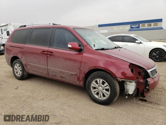 2012 Kia Sedona LX with VIN KNDMG4C77C6501093, listed as a Copart auction lot 48918985 with 194,364 mi miles and Salvage Title. Bid and sale history available at carsss.com. Image 4.