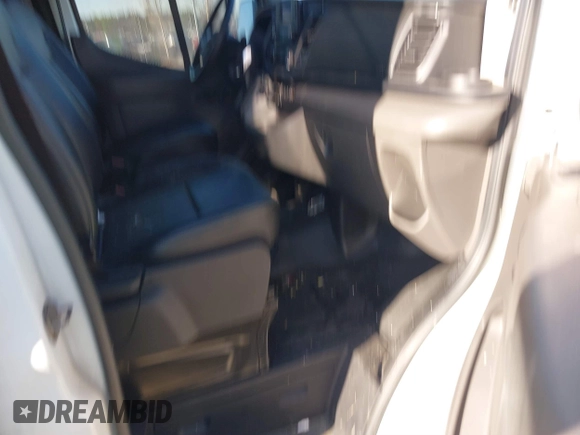 2021 Ford Transit Cargo with VIN 1FTBW3X82MKA14027, listed as a IAAI auction lot 41423524 with 121,221 mi miles. Bid and sale history available at carsss.com. Image 5.