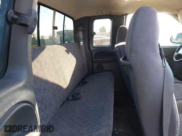 1999 Dodge Ram 2500 with VIN 3B7KC23Z5XG118959, listed as a IAAI auction lot 40484594 with 176,946 mi miles. Bid and sale history available at carsss.com. Image 8.