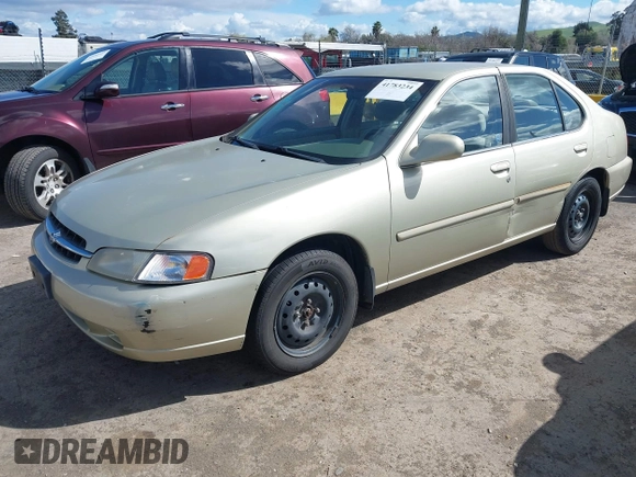 1999 Nissan Altima XE with VIN 1N4DL01D6XC179556, listed as a IAAI auction lot 41783234 with 129,064 mi miles. Bid and sale history available at carsss.com. Image 2.