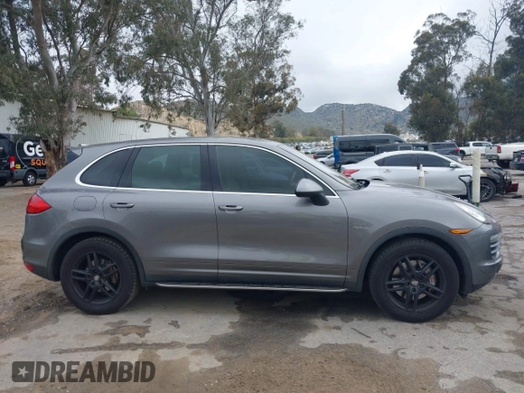 2012 Porsche Cayenne S Hybrid with VIN WP1AE2A25CLA90636, listed as a IAAI auction lot 41922089 with 90,318 mi miles and . Bid and sale history available at DreamBid. Image 14.