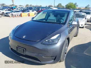 2022 Tesla Model Y Performance z VIN 7SAYGDEF2NF490794, wystawiony jako IAAI lot #42218742 z przebiegiem 41 402 mil mil oraz . Historia ofert i sprzedaży dostępna na DreamBid. Obrazek 19.