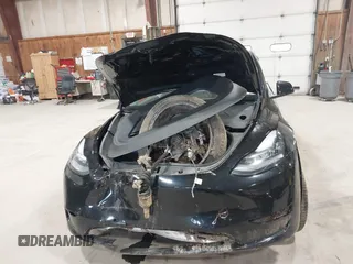 2022 Tesla Model Y Long Range z VIN 7SAYGDEE0NF342215, wystawiony jako IAAI lot #42136858 z przebiegiem 53 037 mil mil oraz . Historia ofert i sprzedaży dostępna na DreamBid. Obrazek 11.