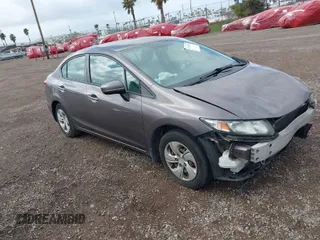 2014 Honda Civic LX z VIN 19XFB2F51EE256181, wystawiony jako IAAI lot #41707181 z przebiegiem 153 859 mil mil oraz . Historia ofert i sprzedaży dostępna na DreamBid. Obrazek 1.