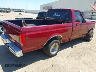 1995 Ford F-150 with VIN 1FTDF15Y1SLA07738, listed as a IAAI auction lot 41972210 with 159,406 mi miles. Bid and sale history available at carsss.com. Image 4.