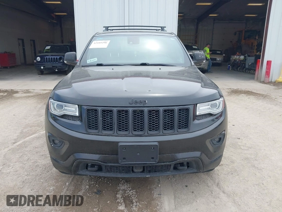 2014 Jeep Grand Cherokee Overland with VIN 1C4RJFCM8EC486259, listed as a IAAI auction lot 42105296 with 129,342 mi miles. Bid and sale history available at carsss.com. Image 12.