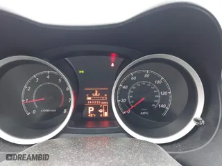 2013 Mitsubishi Lancer SE with VIN JA32V2FW7DU015061, listed as a IAAI auction lot 41863621 with 141,315 mi miles. Bid and sale history available at carsss.com. Image 7.