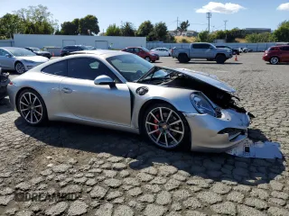 2012 Porsche 911 991 Carrera S with VIN WP0AB2A92CS122102, listed as a Copart auction lot 56574625 with 49,768 mi miles and Salvage title. Bid and sale history available at DreamBid. Image 4.