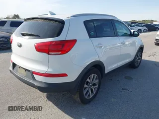 2015 Kia Sportage LX with VIN KNDPB3AC3F7742718, listed as a IAAI auction lot 41877257 with 215,101 mi miles and . Bid and sale history available at carsss.com. Image 4.