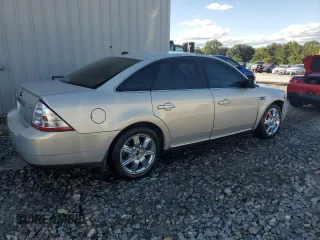 2009 Ford Taurus Limited with VIN 1FAHP25W39G117010, listed as a Copart auction lot 73292634 with 213,529 mi miles and Salvage Title. Bid and sale history available at carsss.com. Image 3.