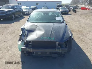 2016 Ford Fusion Titanium Hybrid с VIN 3FA6P0RU8GR266488, выставлен на аукционе IAAI как лот 41903919 с пробегом 74 927 миль миль и . История ставок и продаж доступна на DreamBid. Изображение 13.