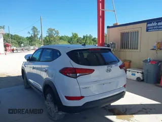 2017 Hyundai Tucson SE with VIN KM8J23A45HU328404, listed as a IAAI auction lot 41695180 with 120,458 mi miles. Bid and sale history available at carsss.com. Image 3.