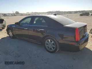 2009 Cadillac STS RWD z VIN 1G6DW67V090167639, wystawiony jako Copart lot #87113674 z przebiegiem 121 498 mil mil oraz Czysty tytuł • Clean title. Historia ofert i sprzedaży dostępna na DreamBid. Obrazek 2.