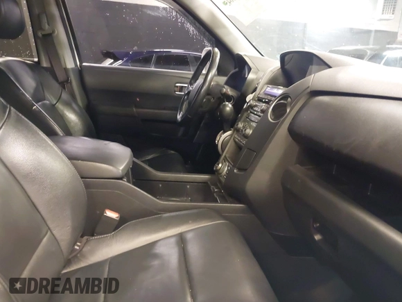2015 Honda Pilot Touring with VIN 5FNYF4H98FB001841, listed as a IAAI auction lot 41955645 with 109,818 mi miles. Bid and sale history available at carsss.com. Image 5.