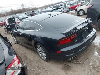 2016 Audi A7 3.0 Premium Plus with VIN WAUWGAFC0GN006470, listed as a IAAI auction lot 41638615 with 104,040 mi miles. Bid and sale history available at carsss.com. Image 3.