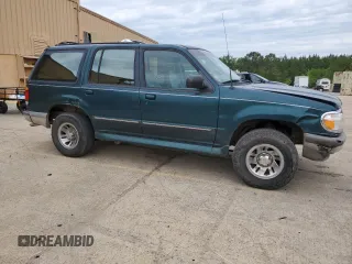 1996 Ford Explorer XL with VIN 1FMDU32X4TUD32047, listed as a Copart auction lot 55014665 with 171,139 mi miles and Salvage title. Bid and sale history available at DreamBid. Image 4.