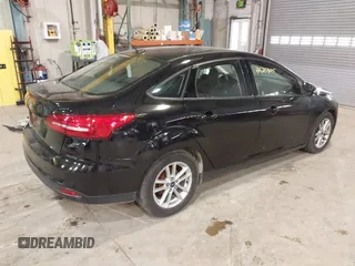 2017 Ford Focus SE with VIN 1FADP3F22HL292063, listed as a IAAI auction lot 41525805 with 104,760 mi miles and . Bid and sale history available at DreamBid. Image 4.