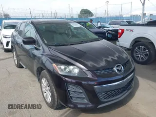 2011 Mazda CX-7 i Touring with VIN JM3ER2CM0B0402889, listed as a IAAI auction lot 42040829 with 134,836 mi miles. Bid and sale history available at carsss.com. Image 1.
