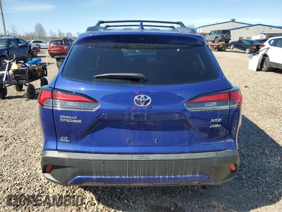 2022 Toyota Corolla Cross XLE with VIN 7MUDAABG3NV006450, listed as a Copart auction lot 53240735 with 19,976 mi miles and Salvage title. Bid and sale history available at DreamBid. Image 6.
