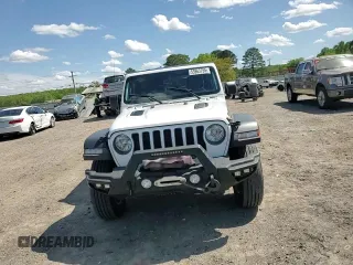 2018 Jeep Wrangler Unlimited Rubicon z VIN 1C4HJXFN3JW176213, wystawiony jako Copart lot #53963755 z przebiegiem 53 094 mil mil oraz Szkoda całkowita • Salvage title. Historia ofert i sprzedaży dostępna na DreamBid. Obrazek 14.