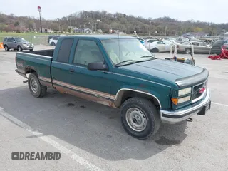 1996 GMC Sierra 1500 z VIN 1GTEK19R5TE506874, wystawiony jako IAAI lot #41838809 z przebiegiem 180 251 mil mil oraz . Historia ofert i sprzedaży dostępna na DreamBid. Obrazek 1.