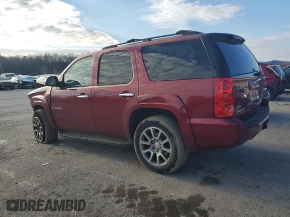 2009 GMC Yukon SLT w/4SA with VIN 1GKFK330X9R207168, listed as a Copart auction lot 85997244 with 123,227 mi miles and Salvage Title. Bid and sale history available at carsss.com. Image 2.