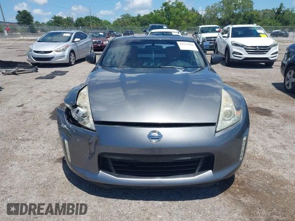 2013 Nissan 370Z Touring z VIN JN1AZ4EH2DM384011, wystawiony jako IAAI lot #42274166 z przebiegiem 87 499 mil mil oraz . Historia ofert i sprzedaży dostępna na DreamBid. Obrazek 12.