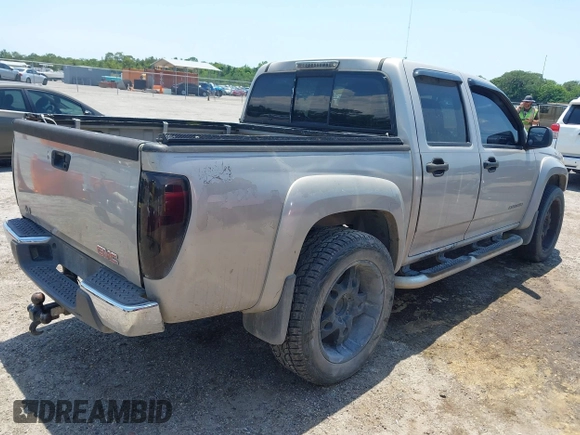 2005 GMC Canyon 1SF SLE Z71 z VIN 1GTDT136958143066, wystawiony jako IAAI lot #42191864 z przebiegiem 192 584 mil mil oraz . Historia ofert i sprzedaży dostępna na DreamBid. Obrazek 4.