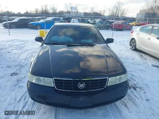 2004 Cadillac Seville Luxury SLS with VIN 1G6KS54Y34U152341, listed as a IAAI auction lot 41299249 with 231,034 mi miles. Bid and sale history available at carsss.com. Image 12.