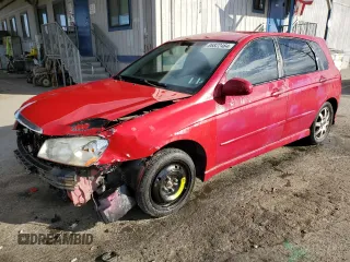 2005 Kia Spectra with VIN KNAFE162255129620, listed as a Copart auction lot 86822464 with 249,516 mi miles and Salvage Title. Bid and sale history available at carsss.com. Image 1.
