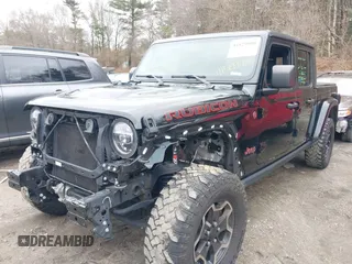 2021 Jeep Gladiator Rubicon z VIN 1C6JJTBG8ML524215, wystawiony jako IAAI lot #41829990 z przebiegiem 62 942 mil mil oraz . Historia ofert i sprzedaży dostępna na DreamBid. Obrazek 18.