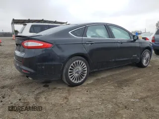 2014 Ford Fusion Titanium Hybrid z VIN 3FA6P0RU1ER118499, wystawiony jako Copart lot #58591305 z przebiegiem 252 353 mil mil oraz Szkody całkowita. Historia ofert i sprzedaży dostępna na DreamBid. Obrazek 3.