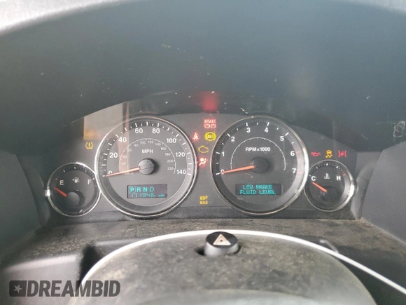 2006 Jeep Commander Limited z VIN 1J8HG58236C299193, wystawiony jako Copart lot #55725905 z przebiegiem 171 946 mil mil oraz Szkoda całkowita • Salvage title. Historia ofert i sprzedaży dostępna na DreamBid. Obrazek 9.