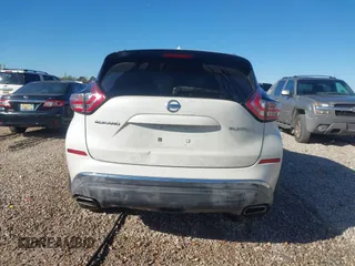 2015 Nissan Murano Platinum z VIN 5N1AZ2MG7FN265552, wystawiony jako IAAI lot #41828490 z przebiegiem 211 465 mil mil oraz . Historia ofert i sprzedaży dostępna na DreamBid. Obrazek 16.