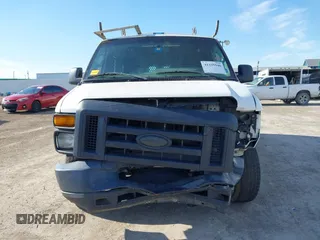2014 Ford Econoline Cargo Commercial with VIN 1FTNE1EW8EDB20428, listed as a IAAI auction lot 41335946 with 201,988 mi miles and . Bid and sale history available at DreamBid. Image 12.