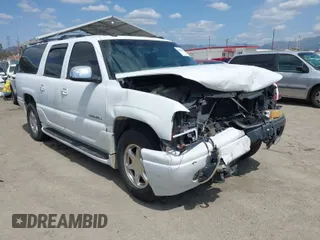 2003 GMC Yukon XL Denali with VIN 1GKFK66UX3J227538, listed as a IAAI auction lot 41915607 with 150,173 mi miles. Bid and sale history available at carsss.com. Image 1.