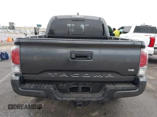 2020 Toyota Tacoma SR5 z VIN 3TMCZ5AN6LM323920, wystawiony jako IAAI lot #41885427 z przebiegiem 153 952 mil mil oraz . Historia ofert i sprzedaży dostępna na DreamBid. Obrazek 16.