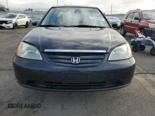 2001 Honda Civic LX with VIN 2HGES16571H607178, listed as a Copart auction lot 74284684 with 144,969 mi miles and Salvage Title. Bid and sale history available at carsss.com. Image 5.